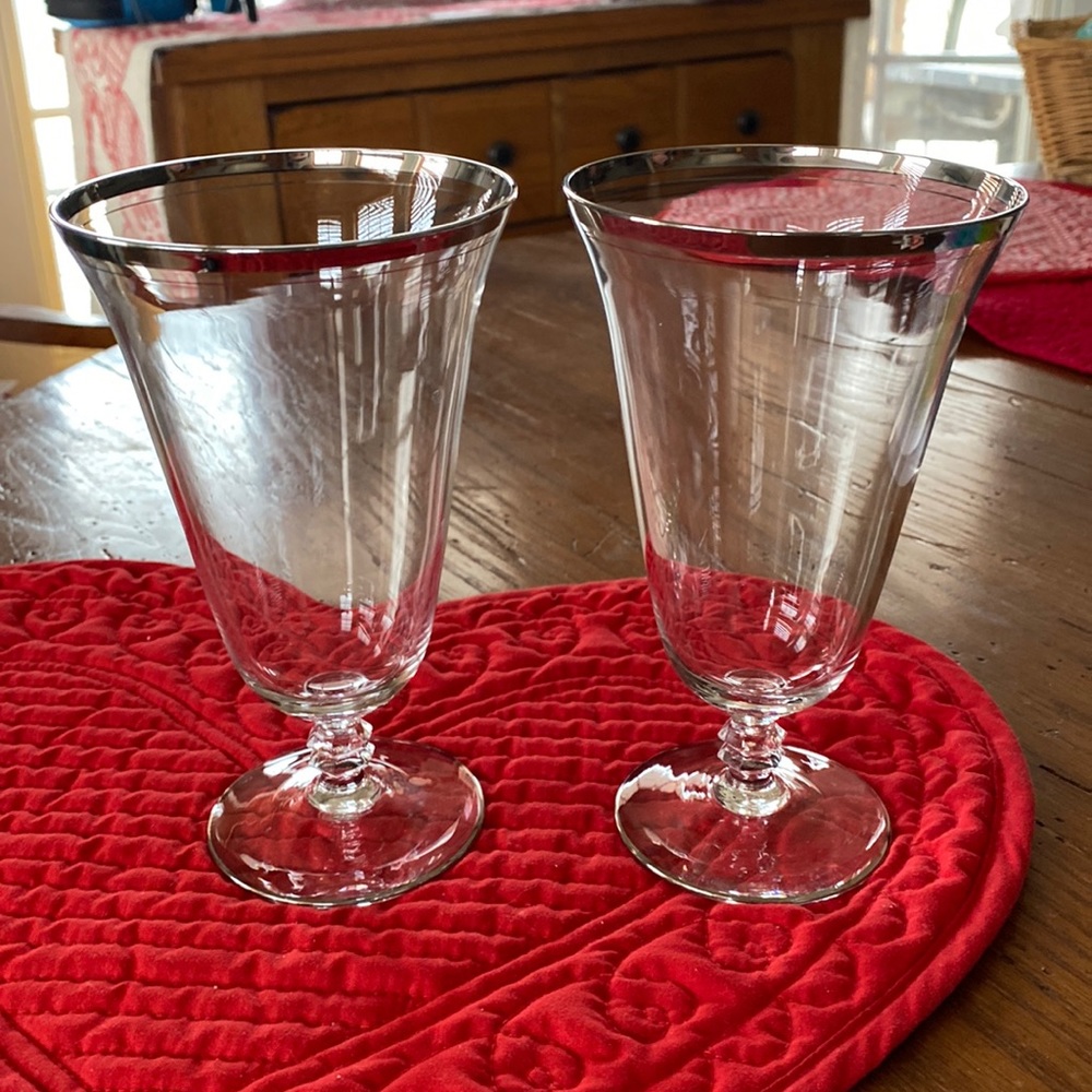 - Beautiful iced tea Crystal goblets silver rim, hand wash only.